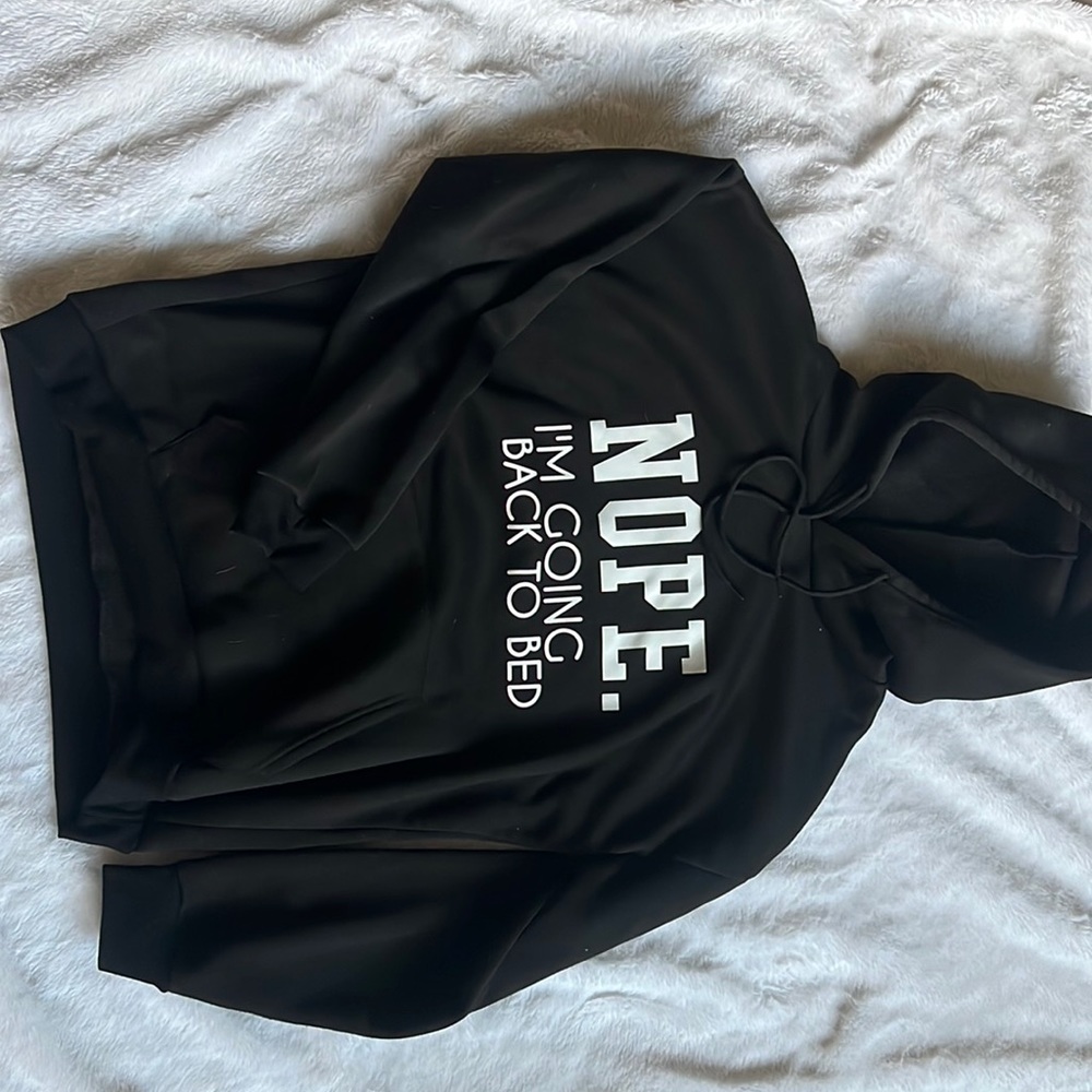 nice all black hoodie with writing on it